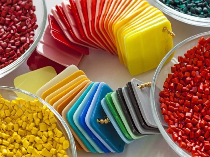 Colorful plastic granules going through a mold temperature controller.