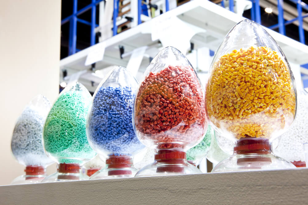 Plastic manufacturing process involves creating enhanced raw plastic material that can be used in product manufacturing.